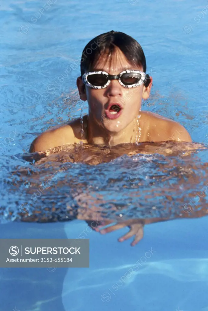 teenaged boy swimming