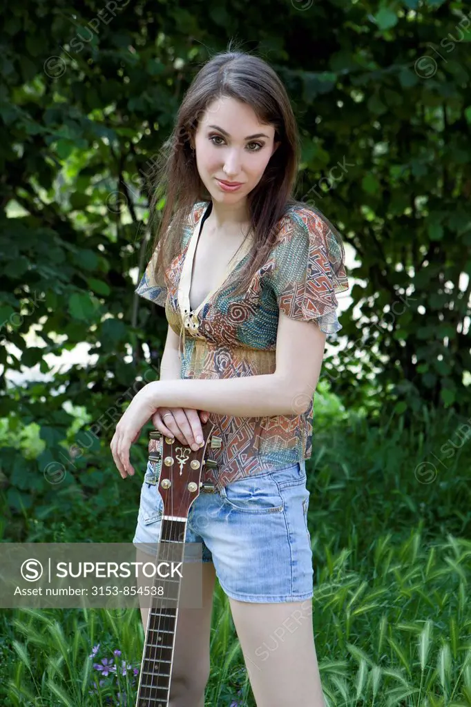 young woman with guitar