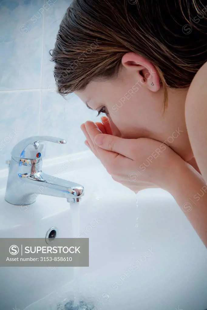 woman washing the face