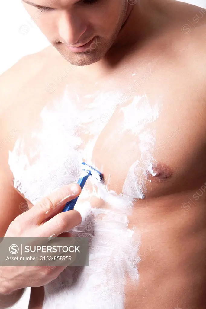man shaving the chest