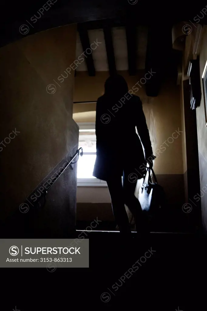 woman climbing the stairs