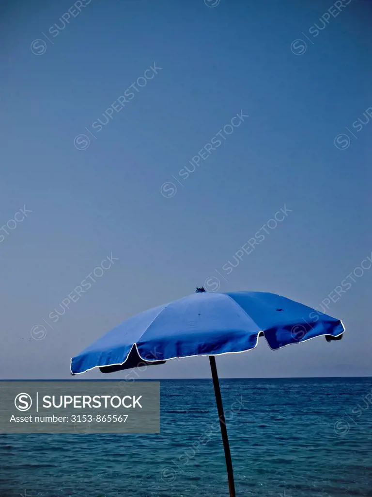 beach umbrella, Milazzo, Sicily, Italy