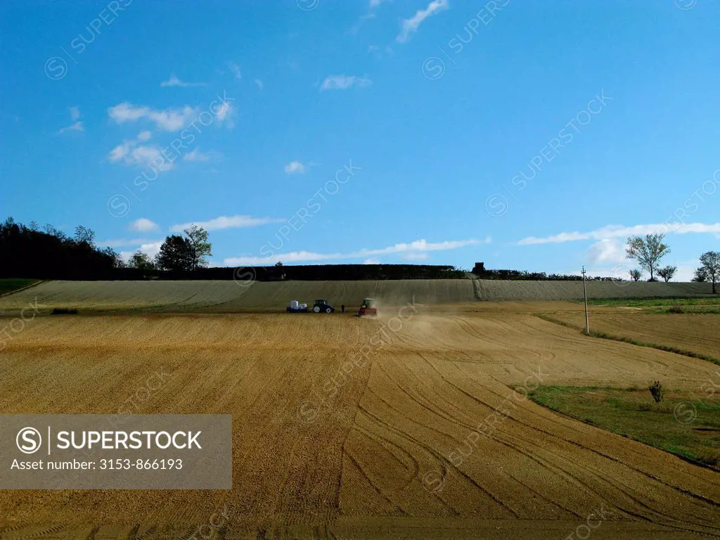 plowed field, tractors, monferrato, piemonte, italy