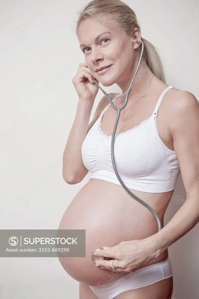 pregnant woman with stethoscope