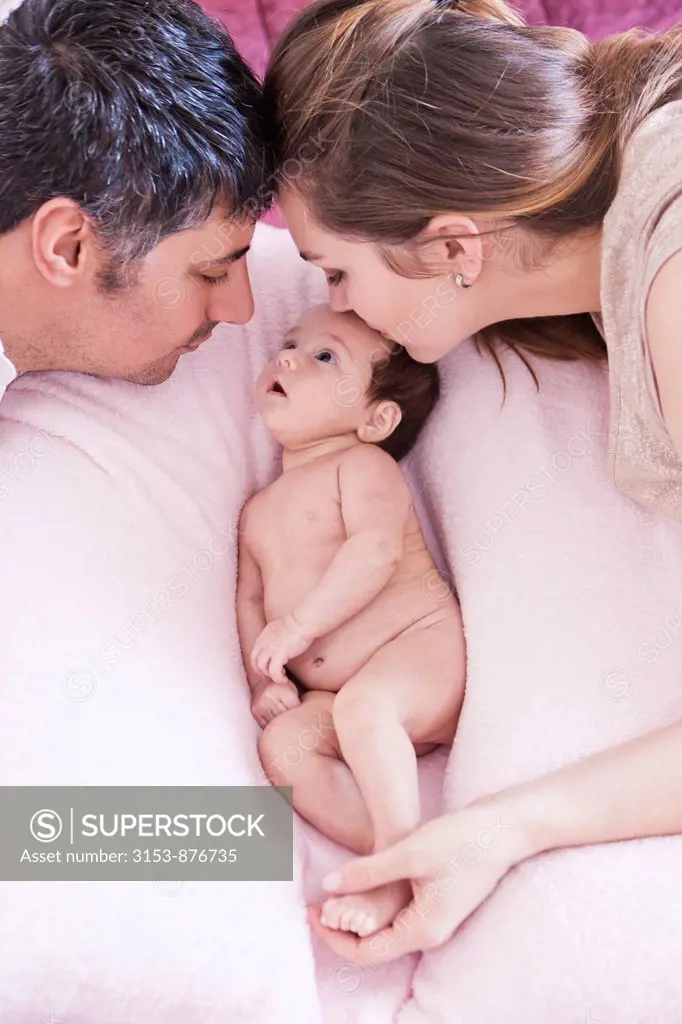 couple with newborn baby girl