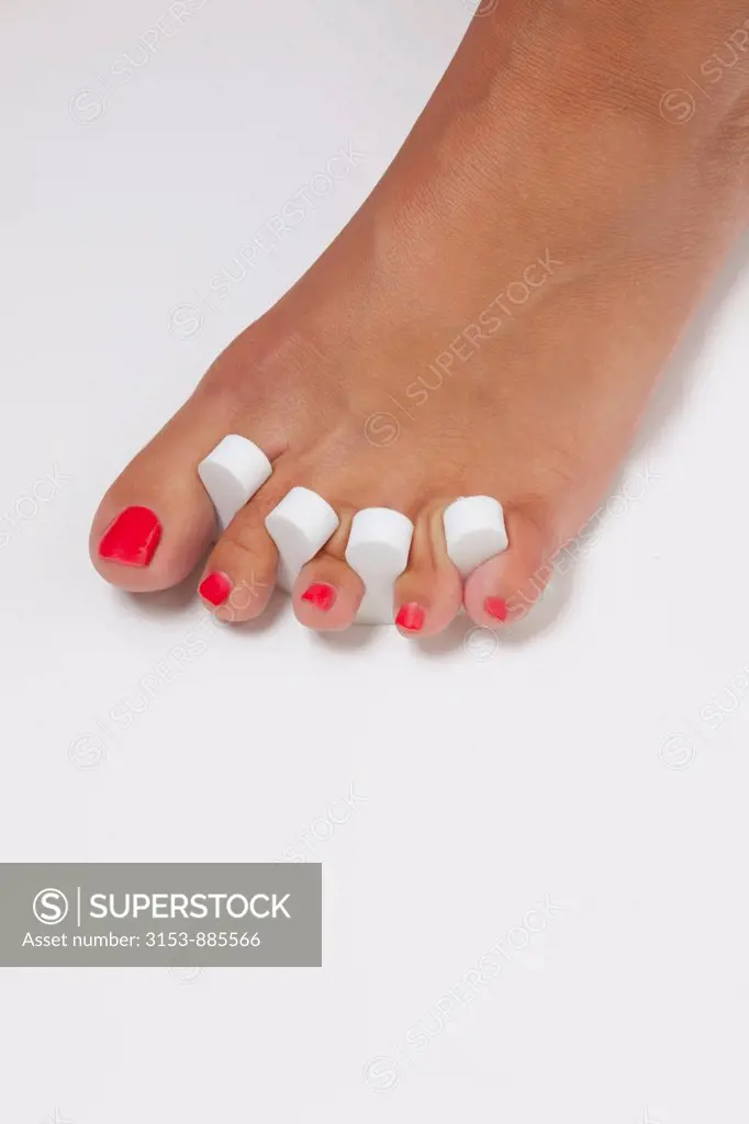 woman feet with separator for fingers