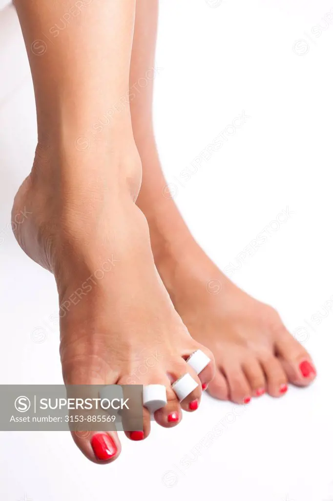 woman feet with separator for fingers