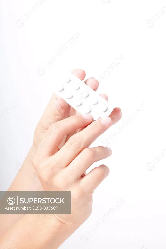 hand of a woman with drugs