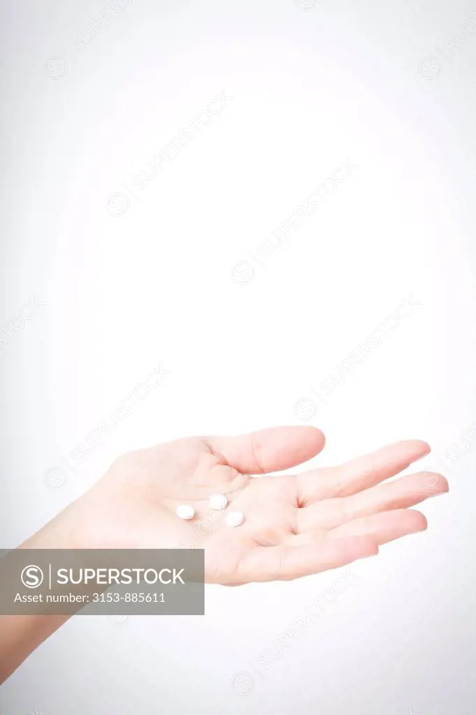 hand of a woman with drugs