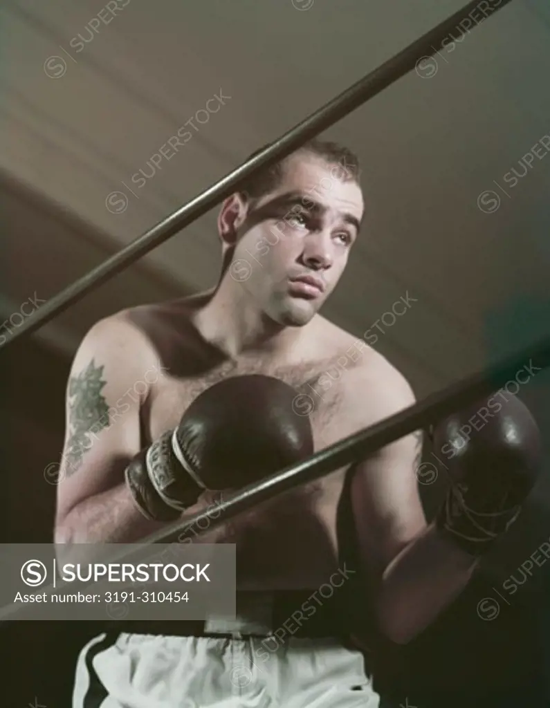 Close-up of a young man in a boxing ring