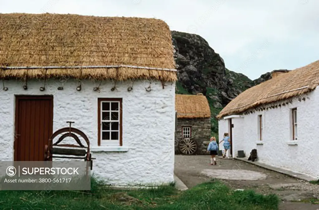 Facade of a thatched roof house, Irish Cottages, Ireland