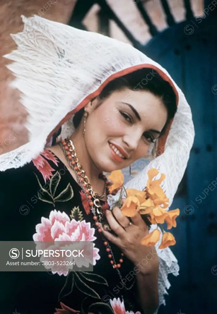 Close-up of a young woman dressed as a tehuana, Mexico