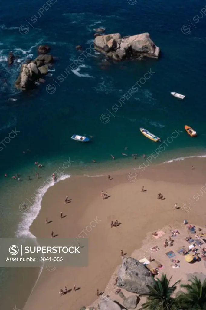 Aerial view of tourists on the beach, Condesa Beach, Acapulco, Mexico