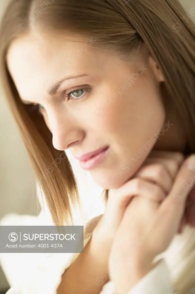 Close-up of a young woman thinking