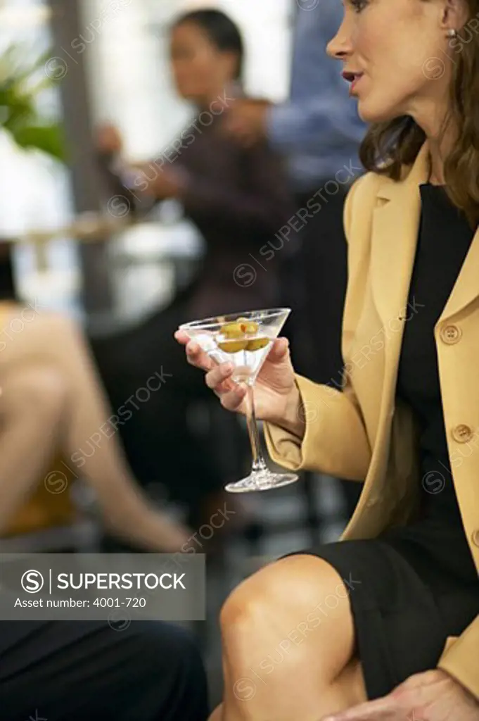 Businesswomen having drinks in a bar