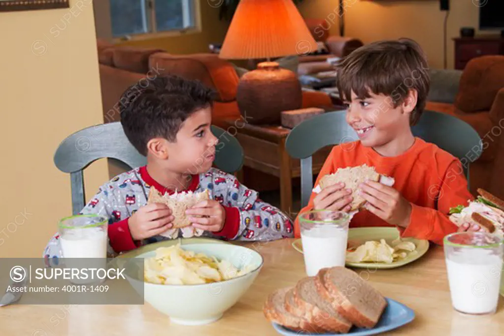 Boys eating lunch together