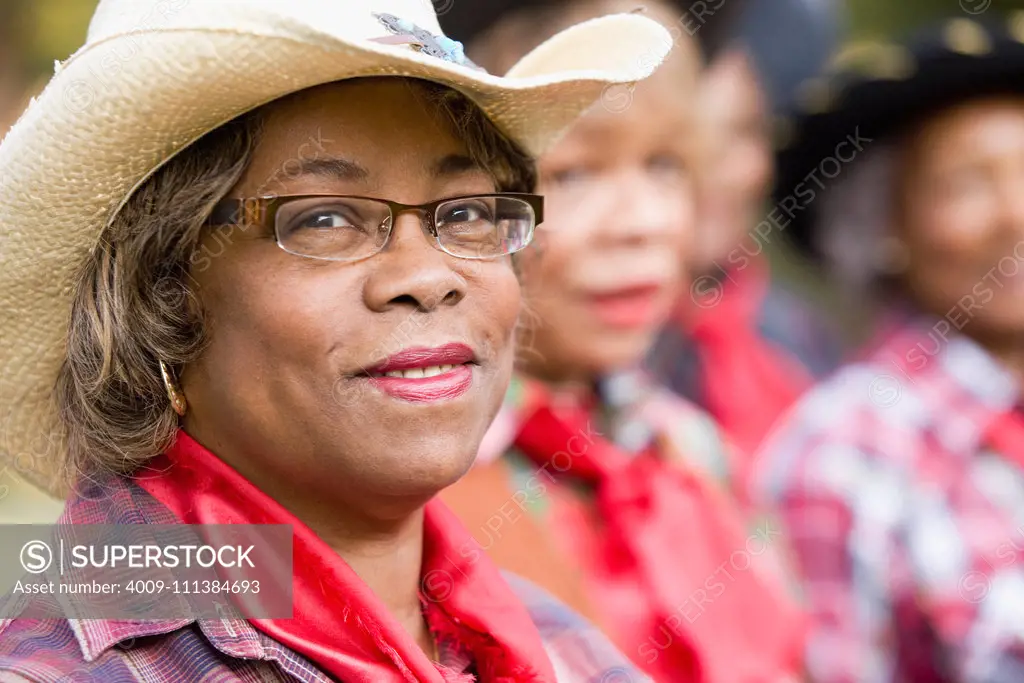 African woman wearing cowboy hat