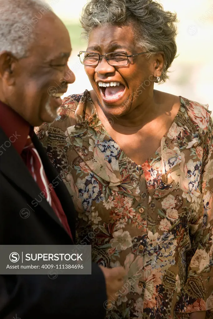 Senior African couple laughing