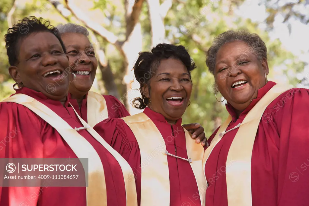 Senior African women singing in choir