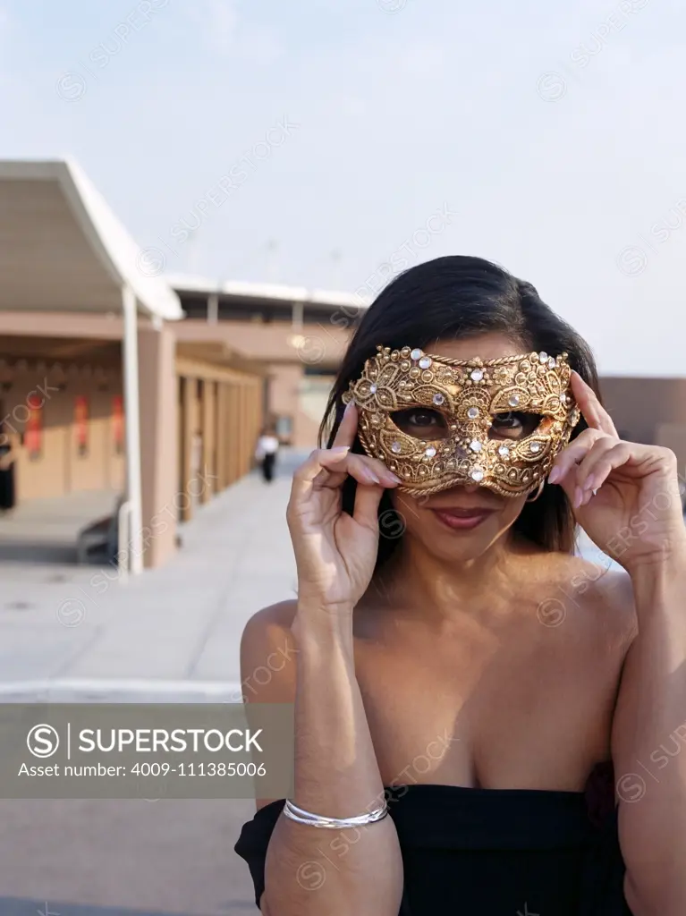 Hispanic woman wearing mask