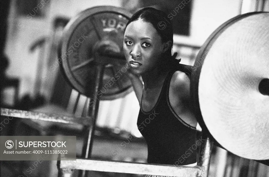 African woman weight lifting