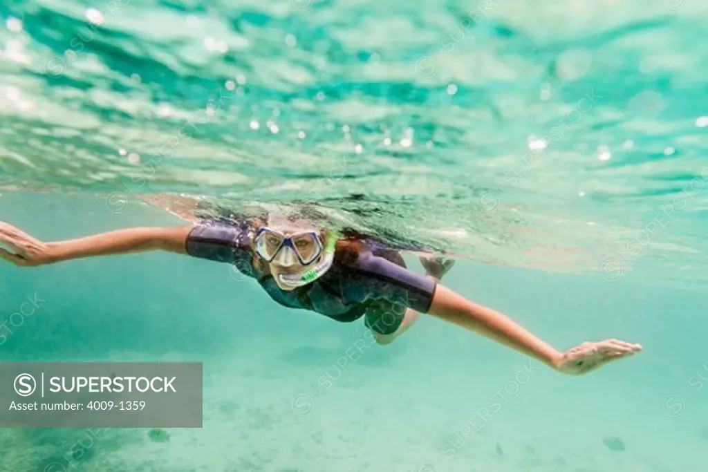 Ecuador, Galapagos Islands, Woman snorkeling in sea