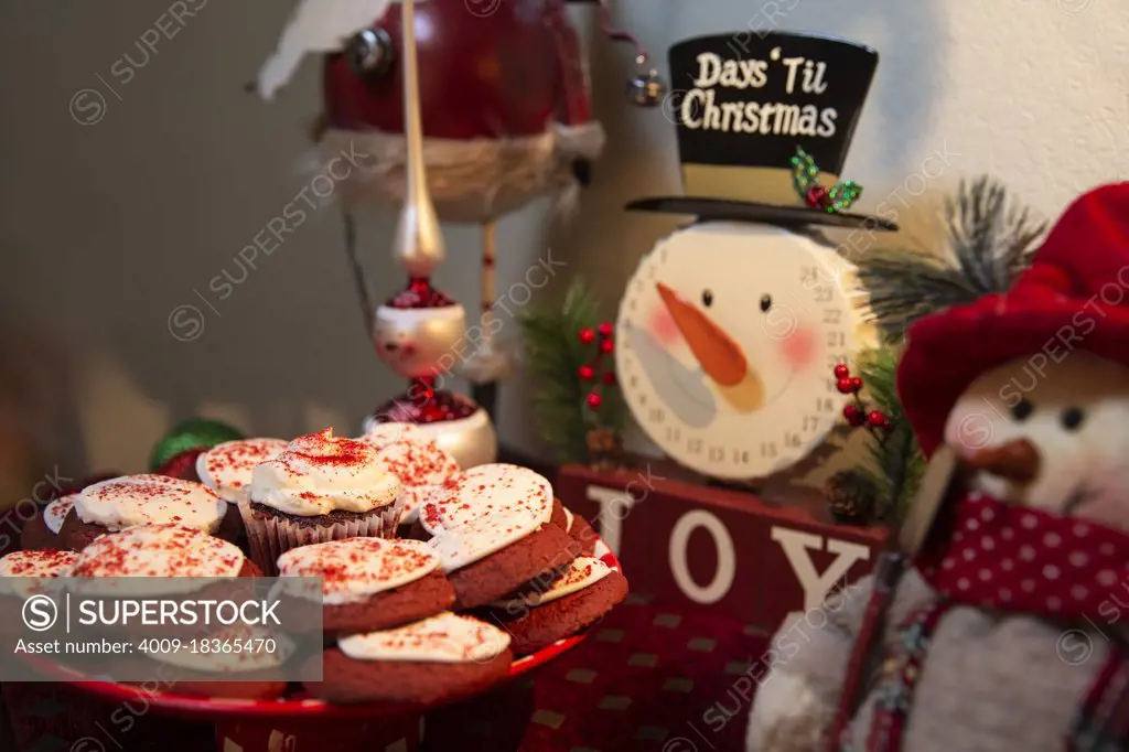 Detail of  dining room table decorated for festive Christmas party with cookies and decorations