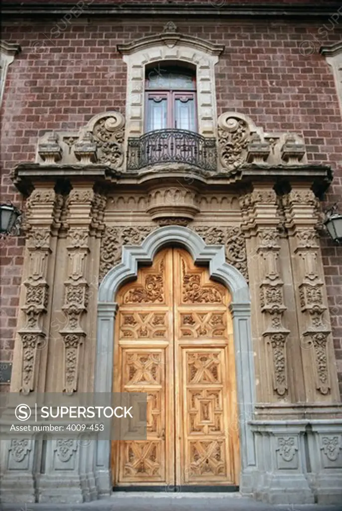 Large ornate door of a palace, Alcazar Palace, Seville, Spain