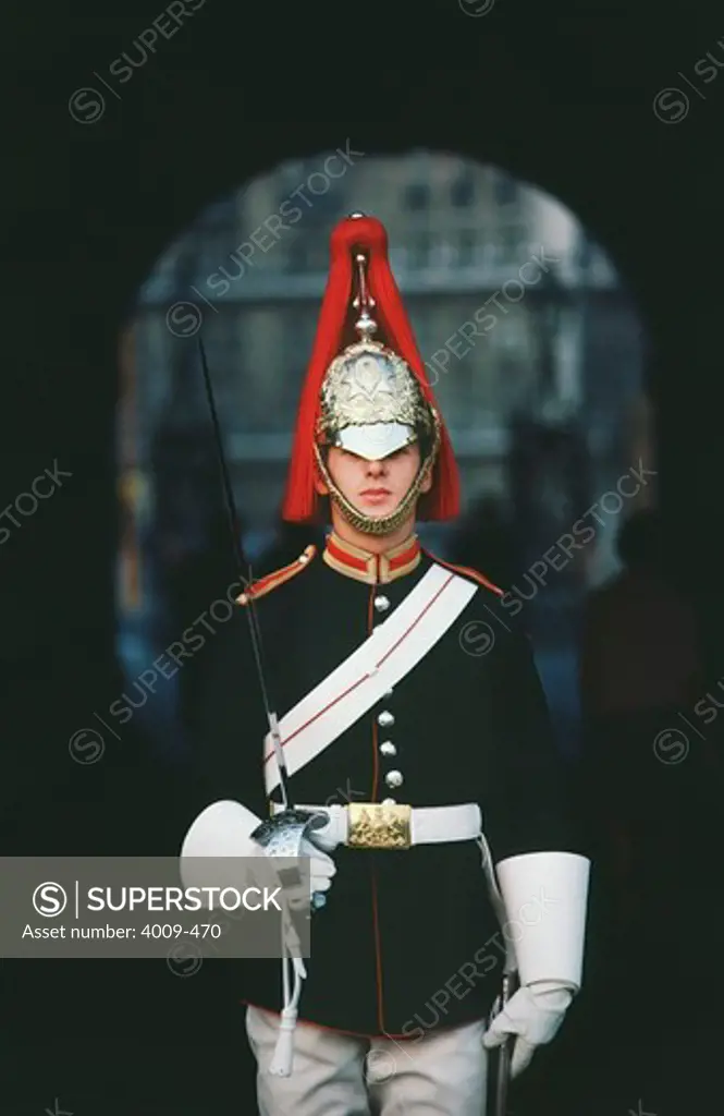 British royal guard holding a sword, London, England