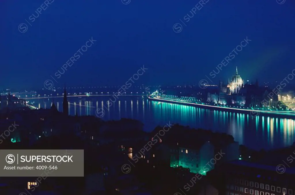 Parliament building lit up at dawn, Hungarian Parliament Building, Danube River, Budapest, Hungary