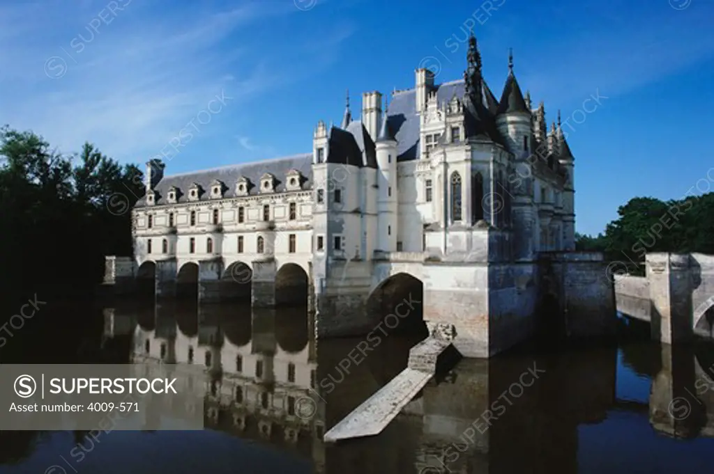 Reflection of a castle in water, Chateau De Chenonceau, River Cher, Chenonceaux, Loire Valley, France