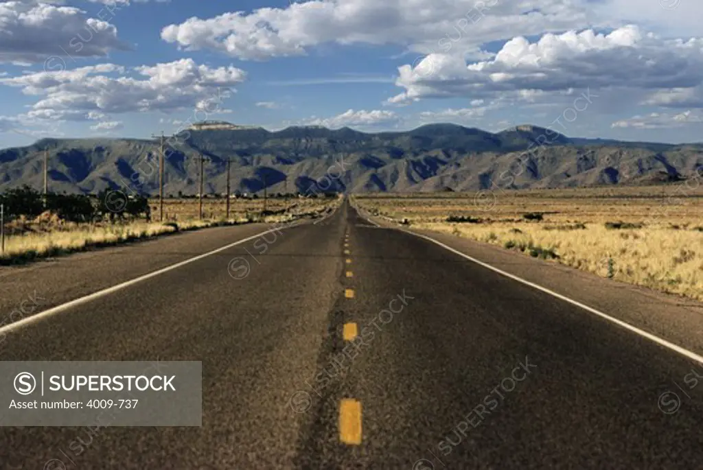 Highway leading to mountain range, Historic Route 66, Arizona, USA