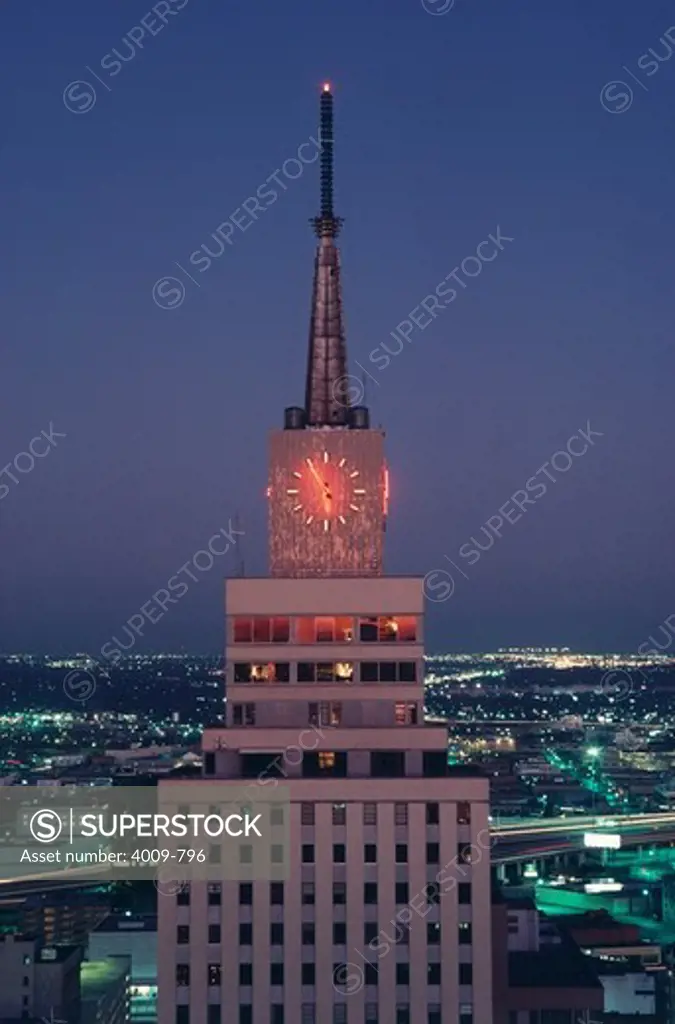 Clock tower of the Mercantile National Bank Building at night, Dallas, Texas, USA