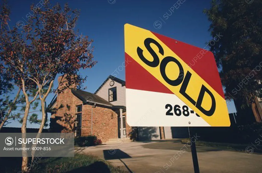 Sold sign in front of a house, Las Colinas, Texas, USA