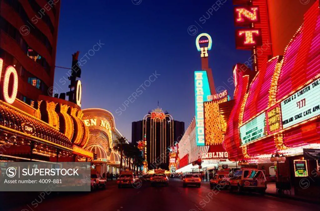 Vintage photo of Neon lights of casinos and restaurants lit up at night, Fremont Street, Las Vegas, Nevada, USA