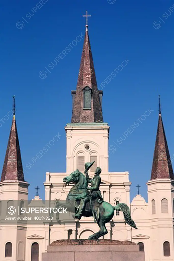 Sculpture of General Andrew Jackson in front of a cathedral, St. Louis Cathedral, Jackson Square, French Quarter, New Orleans, Louisiana, USA