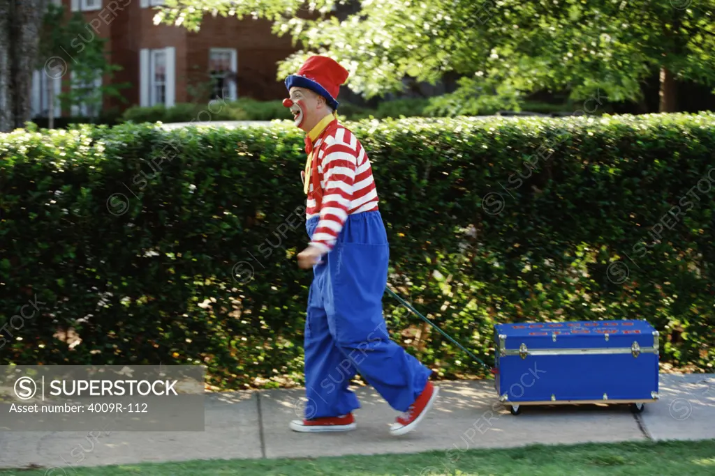Clown pulling a wagon