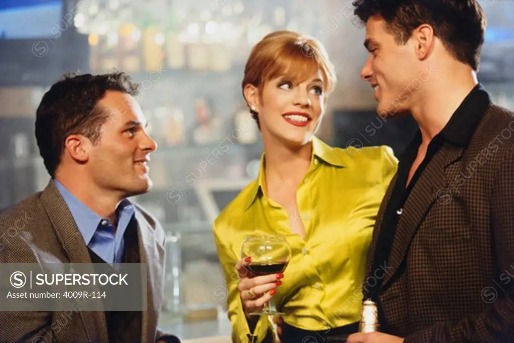 Business executives drinking wine in a bar