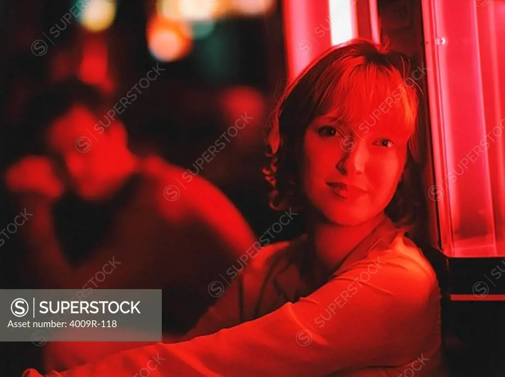 Young woman in an amusement arcade