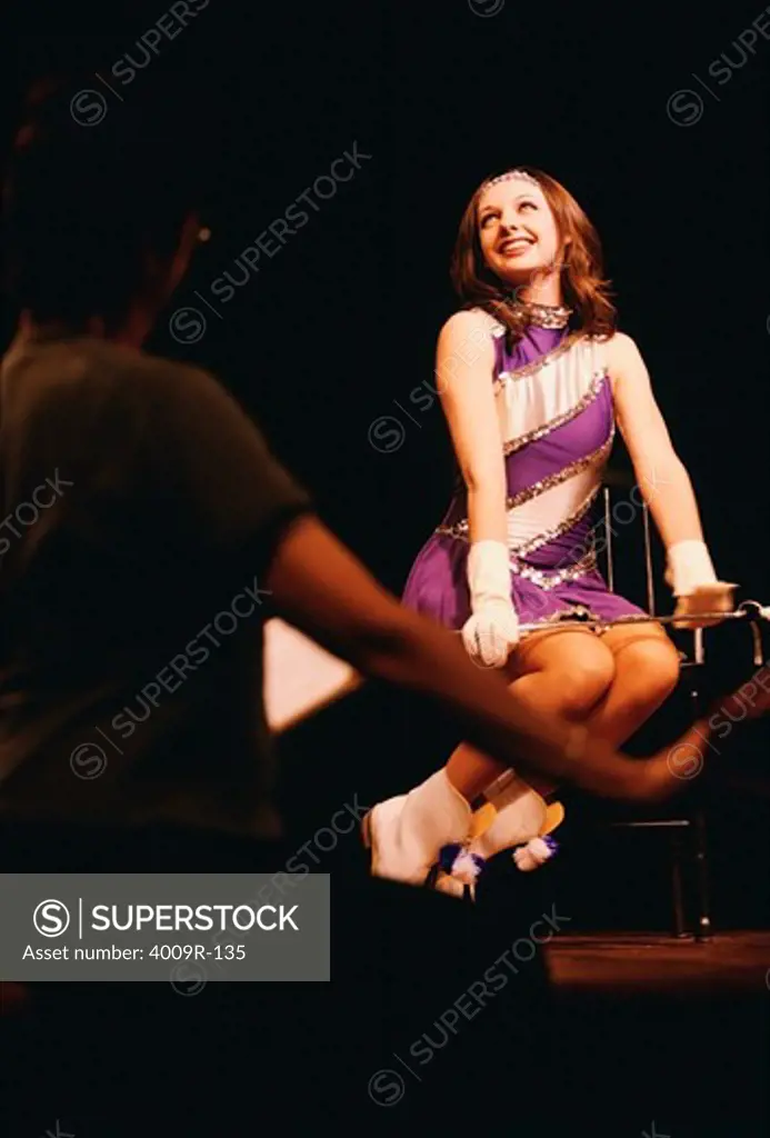 Young woman performing on the stage