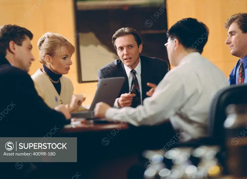 Business executives discussing in a meeting