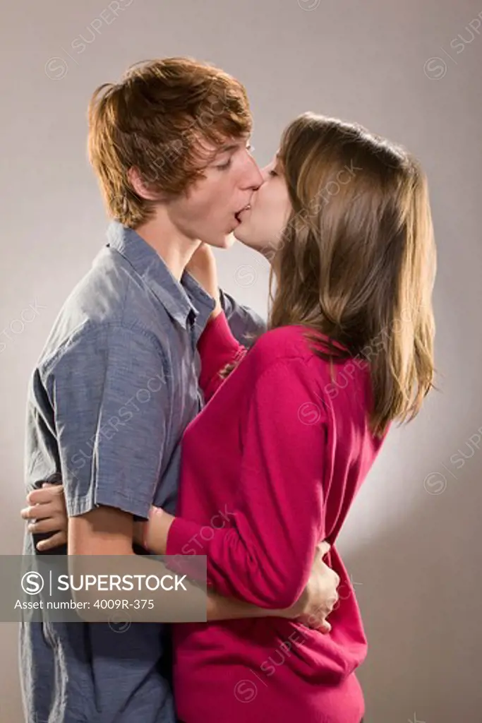 Young couple kissing each other