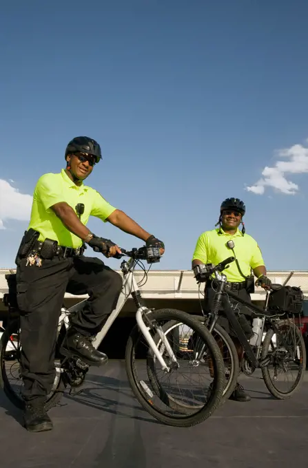 African police officers on bicycles