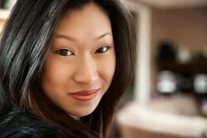 Asian woman smiling