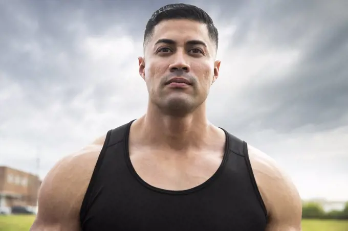 Portrait of muscular Hispanic man wearing tank top