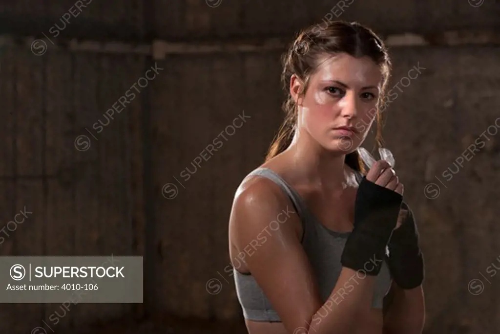 Portrait of a female boxer practicing