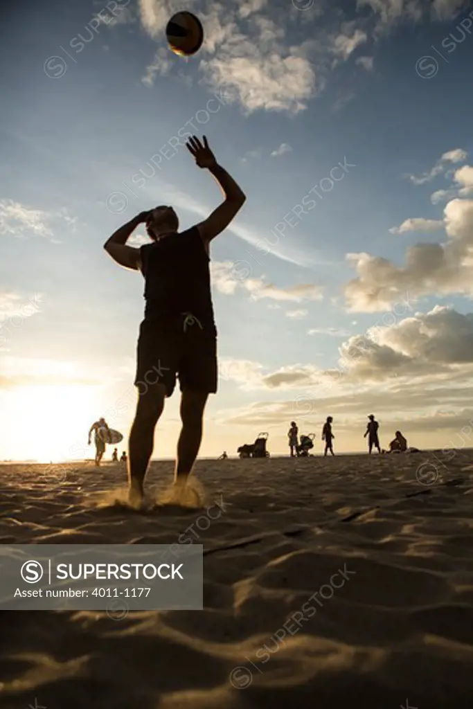 Man playing beach volleyball on the beach, Costa Rica
