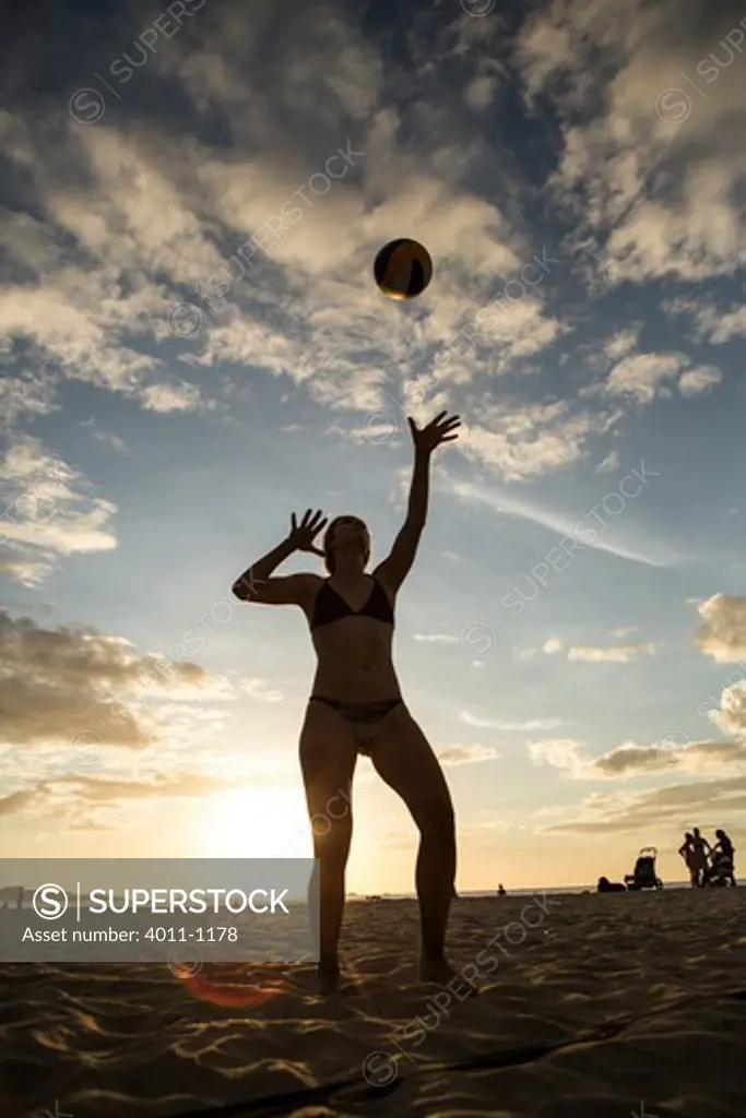 Woman playing beach volleyball on the beach, Costa Rica
