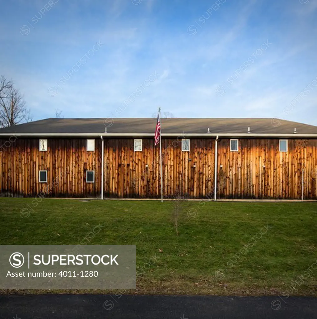 USA, New York State, Binghamton, Wooden building with American Flag