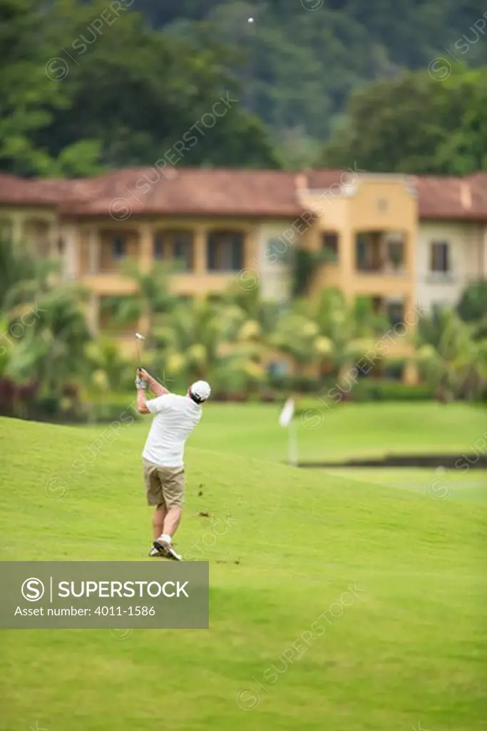 Costa Rica, Golfer hitting from  fairway
